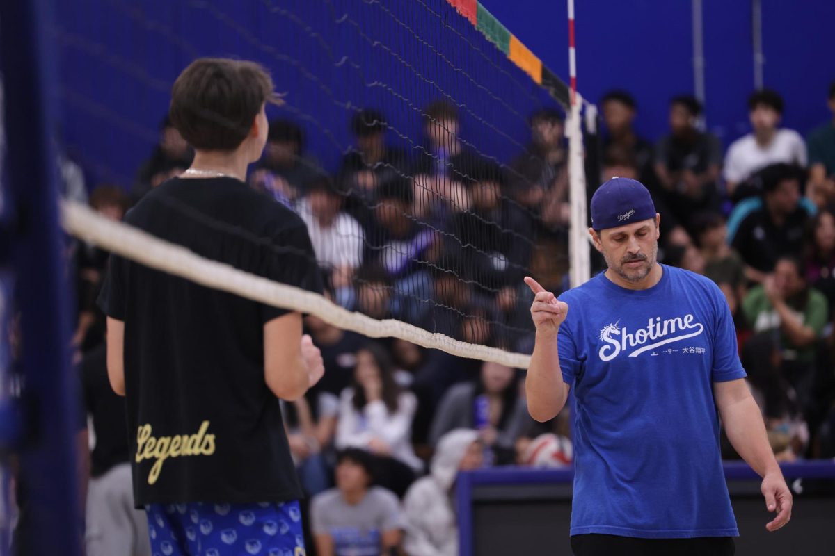 Students bump their way to the top: Students vs. Staff Volleyball Game